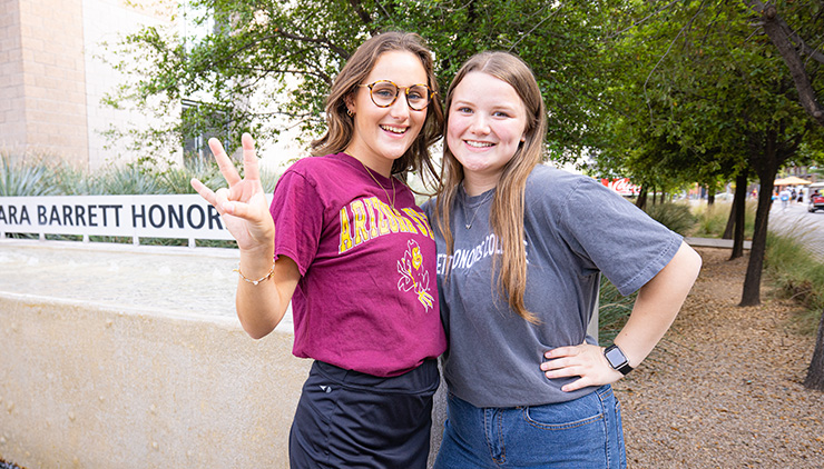 Two ASU students smiling at camera