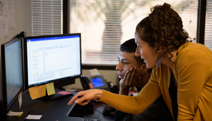 Adviser helping student register