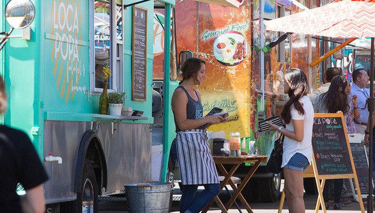 ASU student eating from a food truck in metro Phoenix