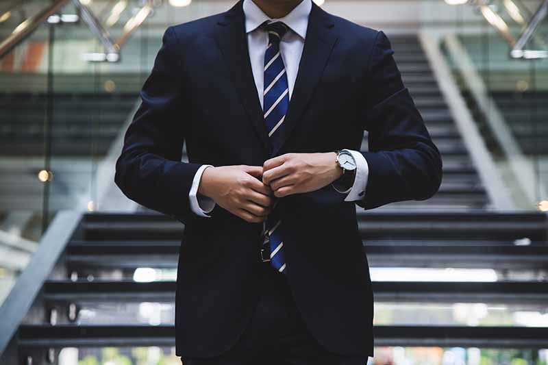 student wearing a suit